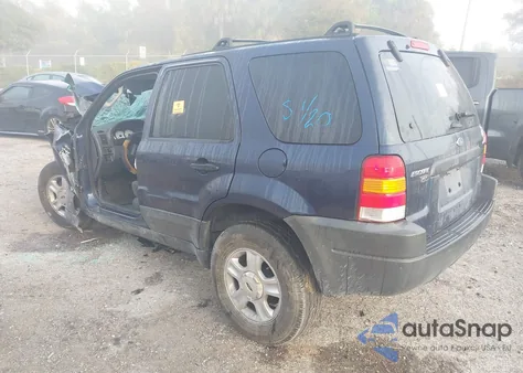 2003 Ford Escape Xlt z USA, uszkodzony, nr VIN 1FMYU03163KC65831